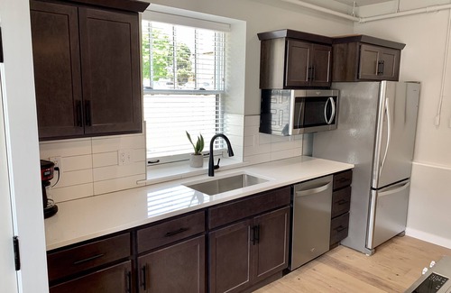 Manhattan Condo | Downtown Haven: New Industrial Condo with Family-Friendly Vibes
