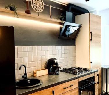 Vitan Apartment | City Center Retreat - Modern Studio with Balcony & Family-Friendly