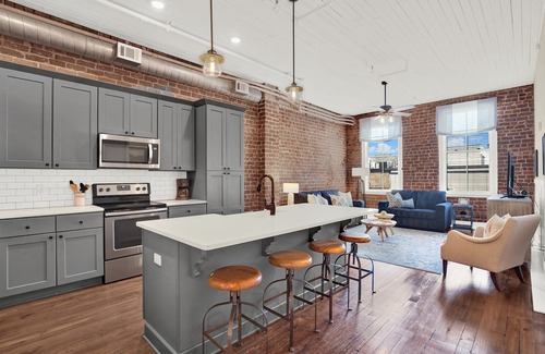 Historic District - North Apartment | Relaxation Awaits: Heated Pool & Spa with Flex Cancellation