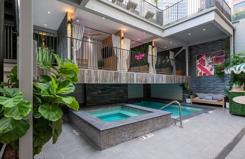 Central Business District Condo | Elegant 3BR Retreat Near French Quarter with Pool & Spa
