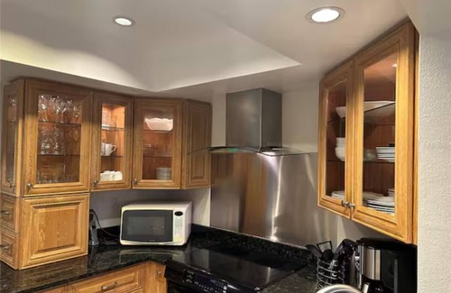 Sarasota Villa | Relax by the Heated Pool and Jacuzzi with Ocean Views