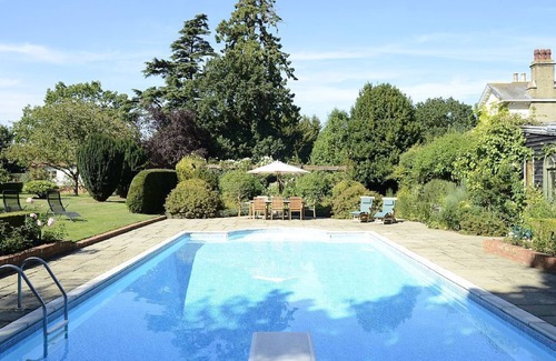 Woodbridge Cottage | Pet-Friendly Retreat with Heated Pool and Enclosed Garden