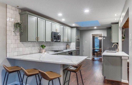Far North Dallas House | Unwind with Heated Pool, Putting Green & Movie Theater