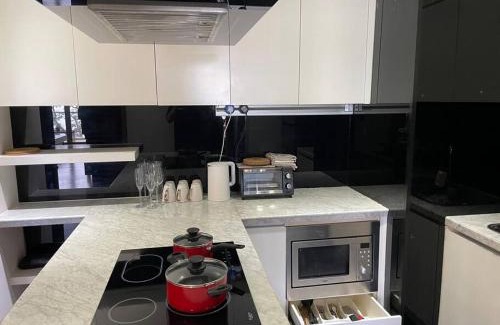 Likas Apartment | Oceanfront Bliss: Heaven in the City Beach Condo