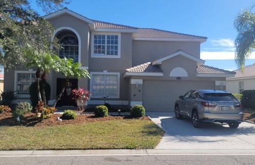 Braden River House | Idyllic Pool Home with Ocean Views on a Golf Course