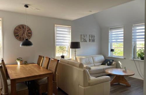 Buitenpost Apartment | Inviting Corner Apartment with Ocean View Near the Village