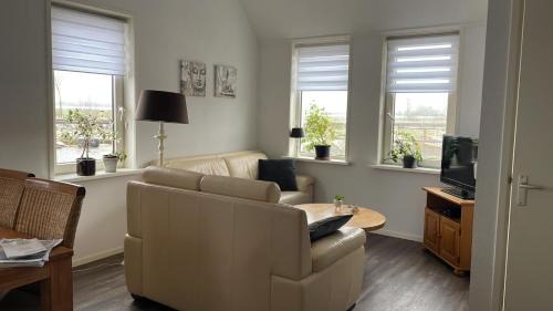 Buitenpost Apartment | Inviting Corner Apartment with Ocean View Near the Village