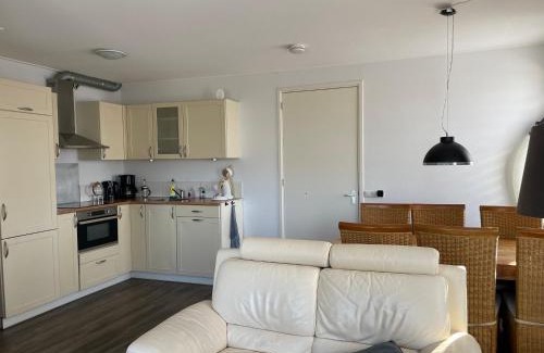 Buitenpost Apartment | Inviting Corner Apartment with Ocean View Near the Village