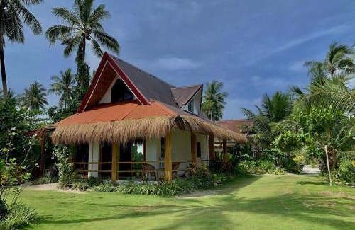 Catangnan Villa | Discover Helmina's Villas: Oceanfront Getaway for Families