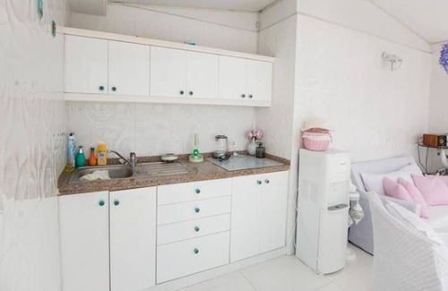 Taksim House | Inviting Helmy Group House Suites with Pool & Spa Amenities