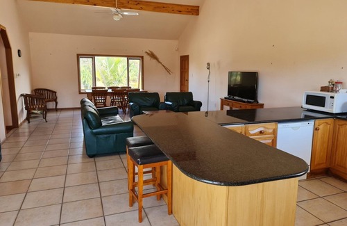 Houhora House | Experience Henderson Bay: Oceanfront Bliss & Top Ratings