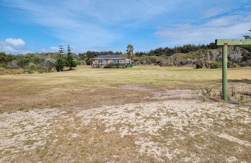 Houhora House | Experience Henderson Bay: Oceanfront Bliss & Top Ratings