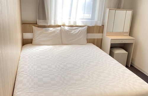 Komatsu Hotel | Eco-Friendly Comfort at Henna Hotel Komatsu Ekimae