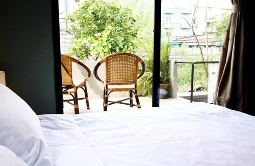 Khao San Hotel | Budget-Friendly Stay at Here Hostel with Pool & Restaurant