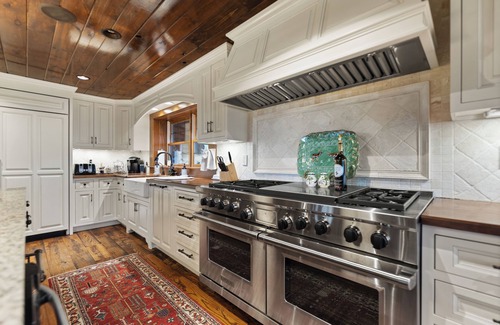 Versailles Cabin | Explore Heritage Lodge: Relax by the Pool and Spa