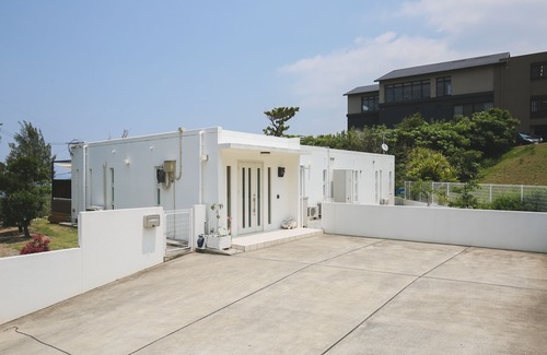 Nakama House | Oceanfront Retreat at Hermit Hills Okimawa with Colors