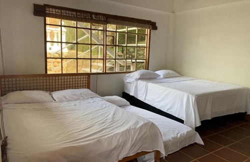 Prado House | Tranquil Cabin Retreat on Private Island in Prado Tolima