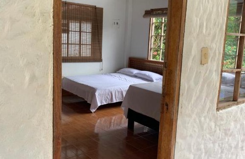 Prado House | Tranquil Cabin Retreat on Private Island in Prado Tolima