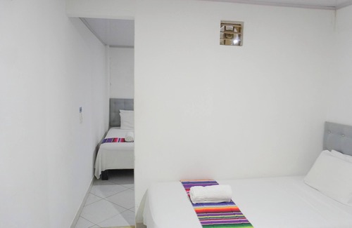 Covenas Hotel | Cozy Quadruple Room Steps from the Beach with Ocean View