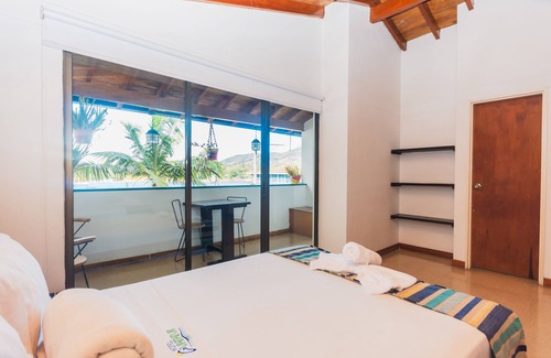 Guatape Hotel | Delightful Family Deluxe Room in Beautiful Guatapé