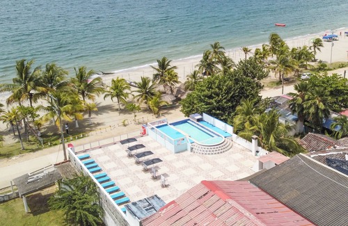 Covenas Hotel | Beachfront Quintuple Room with Pool and Ocean Views