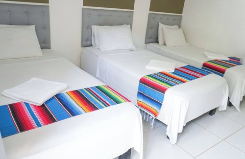 Covenas Hotel | Cozy Triple Room Steps from the Beach with Ocean View