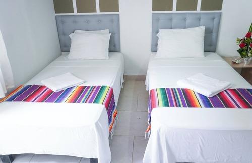 Covenas Hotel | Cozy Triple Room Steps from the Beach with Ocean View