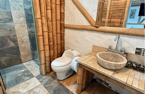 Medellin Hotel | Discover Deluxe Suite Comfort in Santa Elena with Spa Access