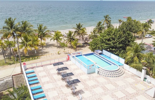 Covenas Hotel | Enjoy Beachside Comfort in a Standard Room by the Ocean