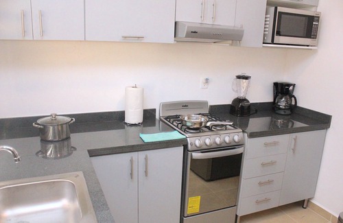 Puerto Juarez House | Charming Hermosa Residencia in Playa del Carmen Awaits