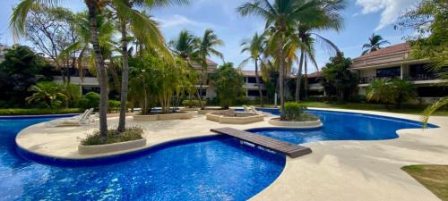 Playa Coronado Apartment | Seaside Suite with Golf Views and Private Beach Access