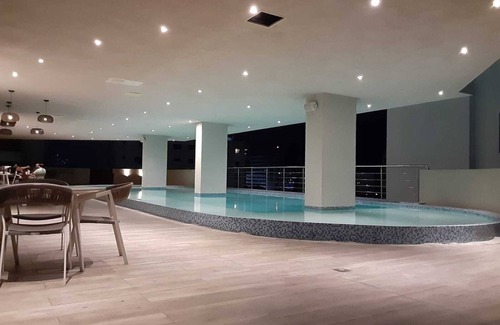 La Julia Apartment | Scenic City Views with Pool, Spa & Fitness Center