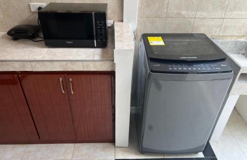 Calle 26 Apartment | Convenient Apartment Near the Airport - Pet and Child Friendly