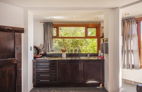 Belgrano Apartment | Scenic Retreat with Lake and Mountain Views Await You