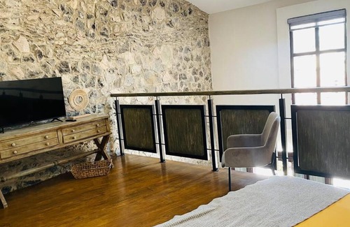 Santeagueda Apartment | Elegant Loft Retreat in Valquirico - Highly Rated at 9.5/10