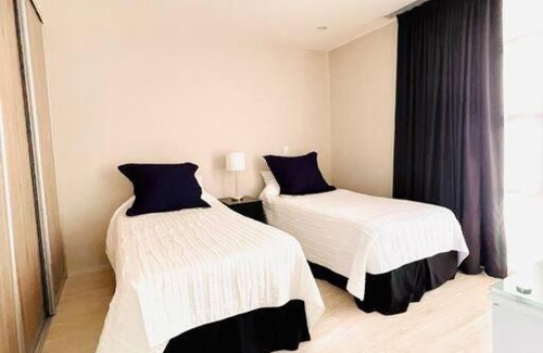 Santa Ana Apartment | Elegant Penthouse Duplex with Pool and Family-Friendly Amenities