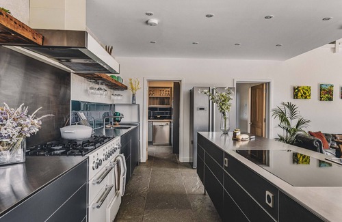 Honiton Ski Chalet | Explore Heron House: Eco-Home with Unique Amenities