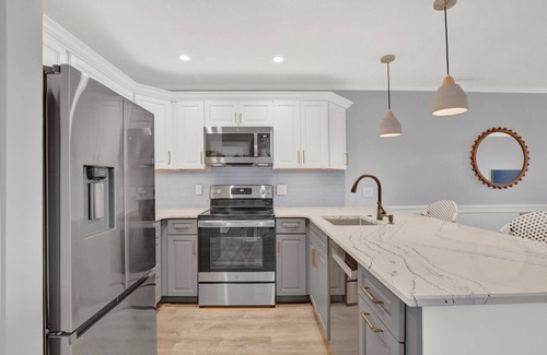 Heron Harbour Isle Condo | Family-Friendly Bayside Condo with Ocean Views & Pool