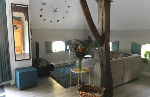 Ruitenveen Apartment | Oceanfront Retreat at Het Achterhuis - Highly Rated Getaway