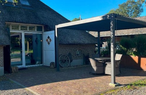 Ruitenveen Apartment | Oceanfront Retreat at Het Achterhuis - Highly Rated Getaway