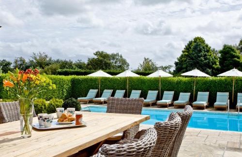 Hewas Water House | Relax at Hewas Water House: Pet Friendly with Pool & Hot Tub