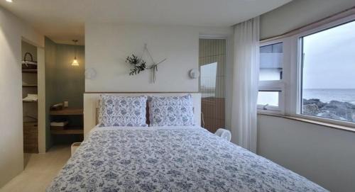 Hallim House | Relax at Hay Day Jeju: Oceanfront Retreat with Pool Access