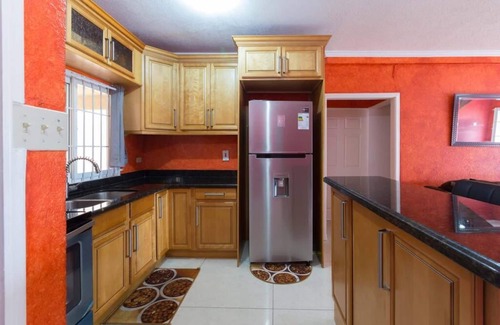 New Kingston Condo | HGTV Featured Central Penthouse: Pool, Views & Jacuzzi Tub