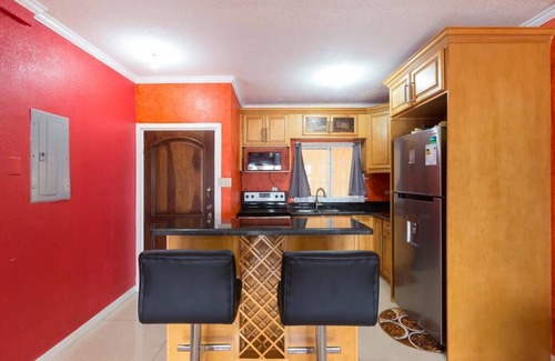 New Kingston Condo | HGTV Featured Central Penthouse: Pool, Views & Jacuzzi Tub