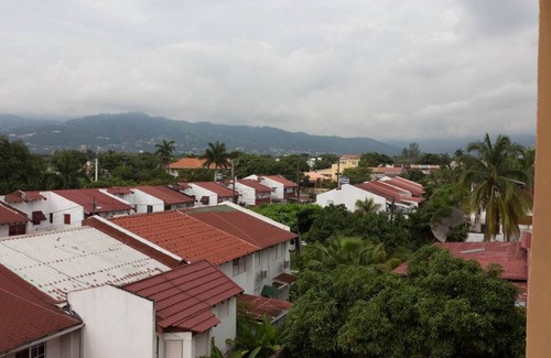 New Kingston Condo | HGTV Featured Central Penthouse: Pool, Views & Jacuzzi Tub