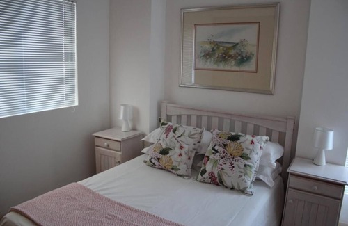 Strand Hotel | Discover Hibernian Towers 505 Apartments with Pool & Spa