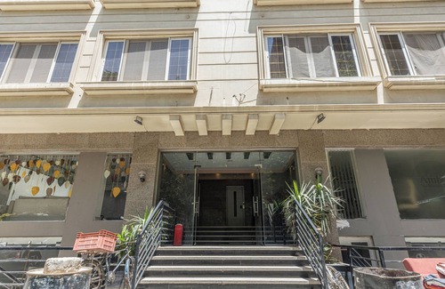 Taqseem Laselky Apartment | Hibiscus Haven Suite: Family-Friendly with Breakfast & Kitchen
