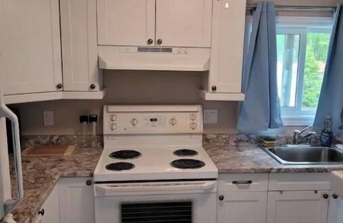 St. Charles Cottage | Lakefront Retreat: Pet-Friendly with Hot Tub & Scenic Views