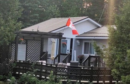 St. Charles Cottage | Lakefront Retreat: Pet-Friendly with Hot Tub & Scenic Views