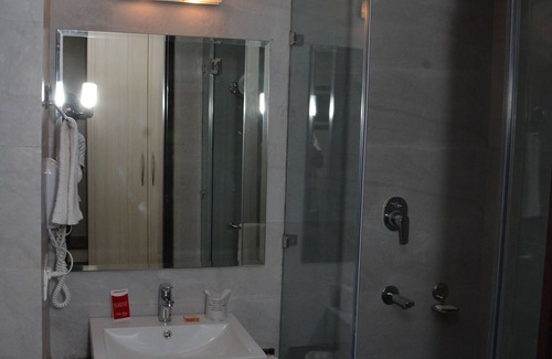 Noida Hotel | Relax at Hide Away Suites with Pool and Family Amenities